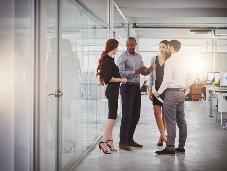 People in an office networking