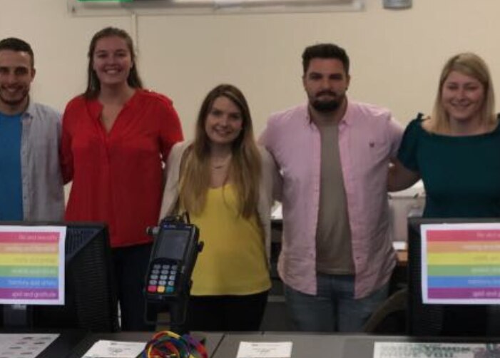 Group of Enterprise employees at the checkout counter