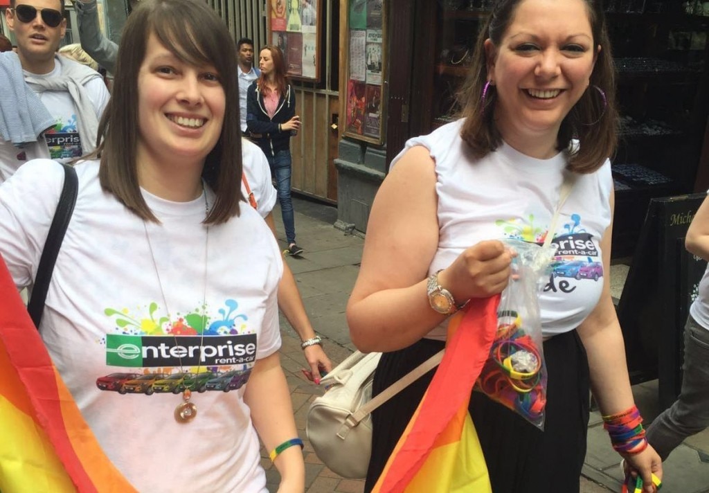 Alice and another female wearing Enterprise shirts at a PRIDE event