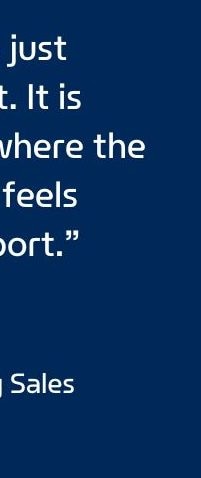 Jo with her son in a bike helmet with a quote