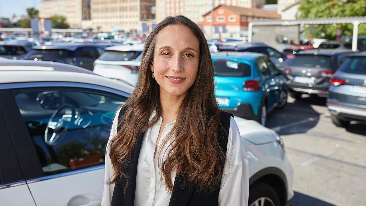 Team member smiling to camera 