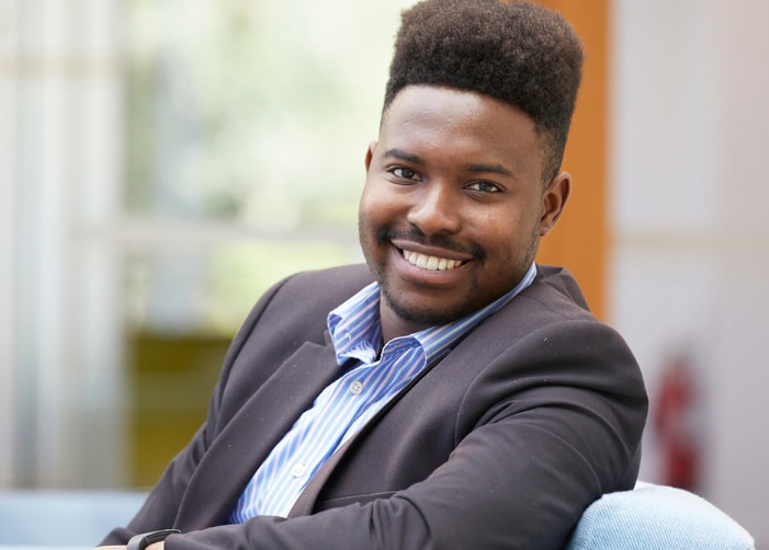 Professional portrait sitting in chair