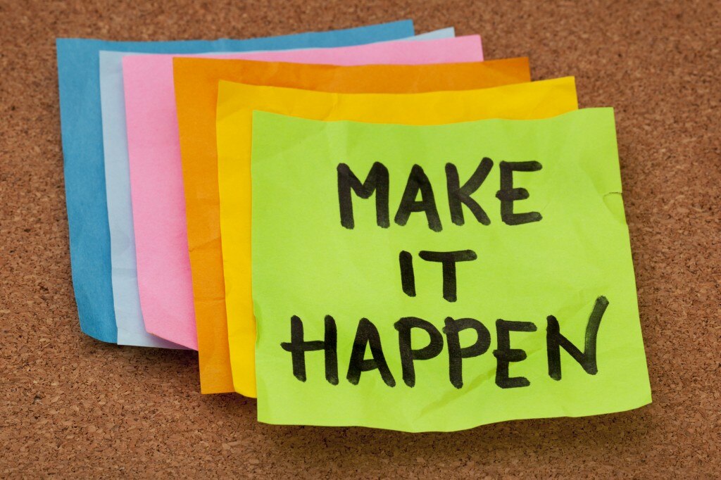 Sticky notes on a cork board 