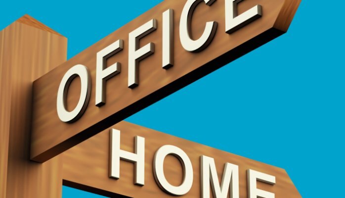 Wooden street sign showing the intersection of "office" and "home"