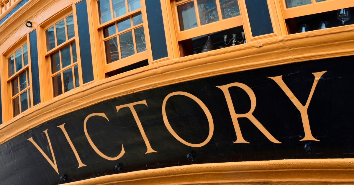 Black and gold building that says "Victory"