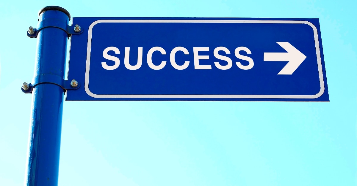 Road sign that says success