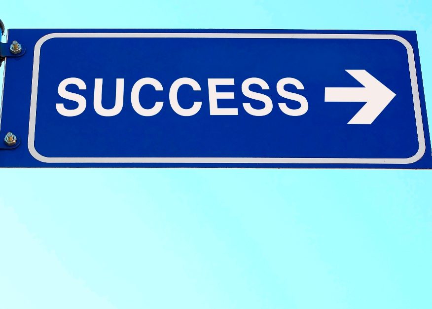 Road sign that says success