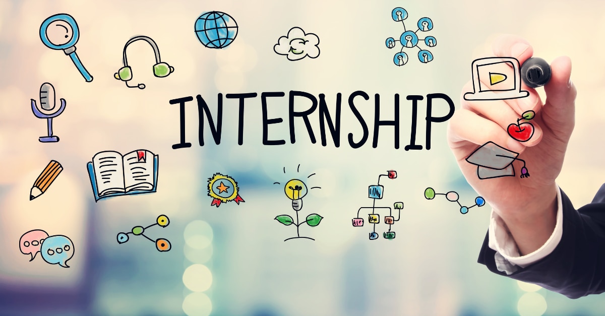 Hand drawing icons on glass around the word "internship"