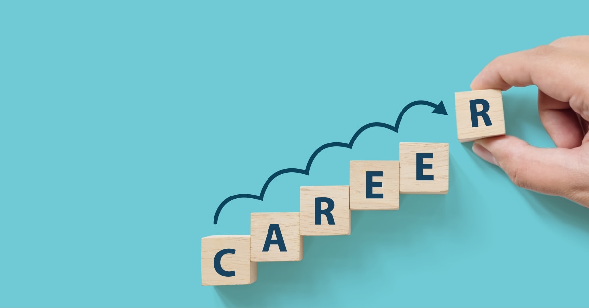 Blocks being arranged in a stair step pattern to spell "Career"