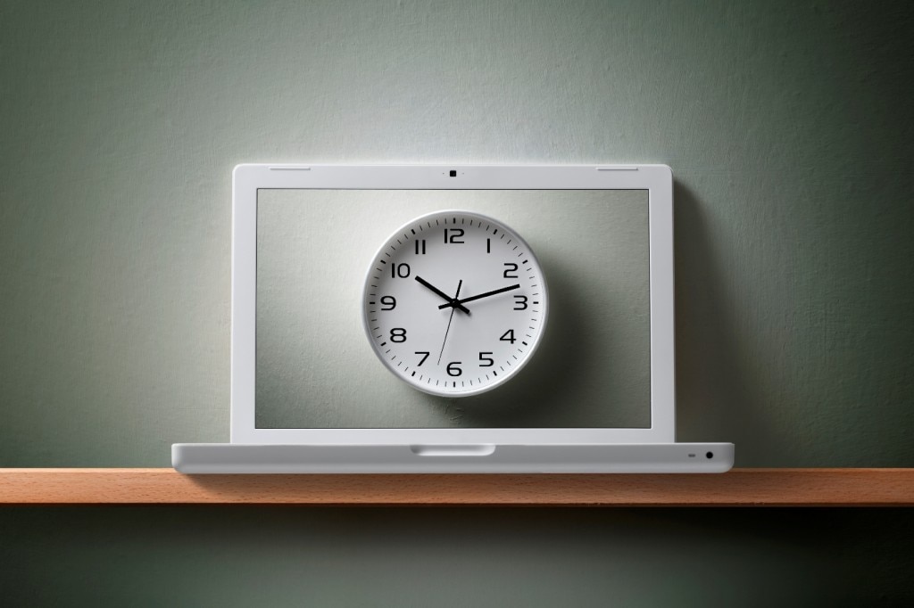 Analog clock on laptop screen