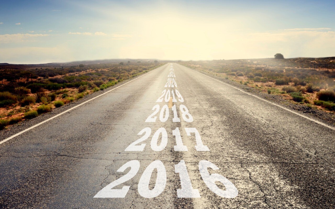 Road with years in progression painted on it starting with 2016