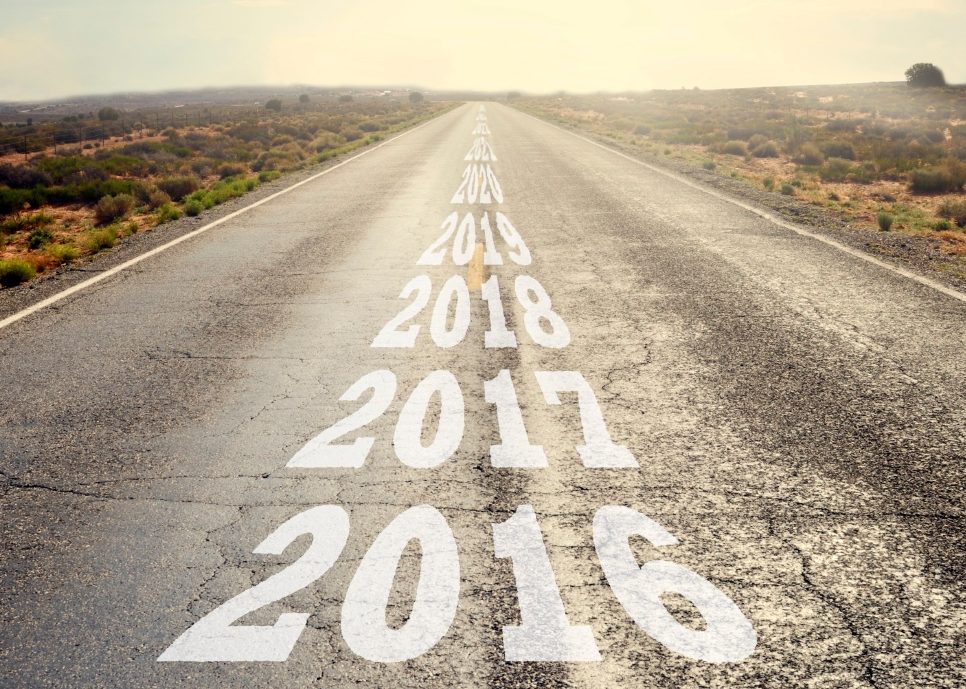 Road with years in progression painted on it starting with 2016