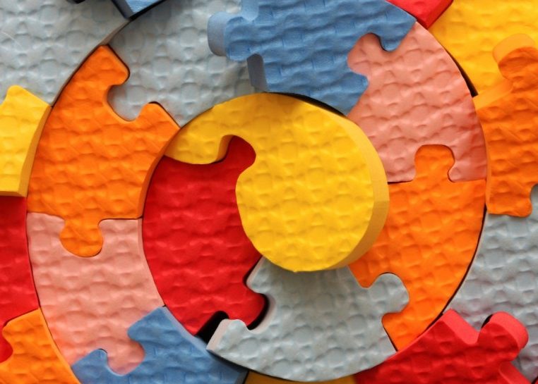 Puzzle pieces in a spiral shape