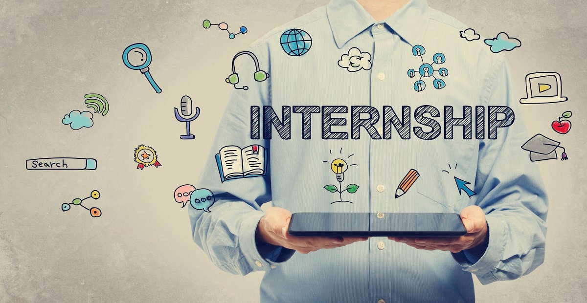Man in dress shirt holding an iPad with "Internship" and other icons coming from it