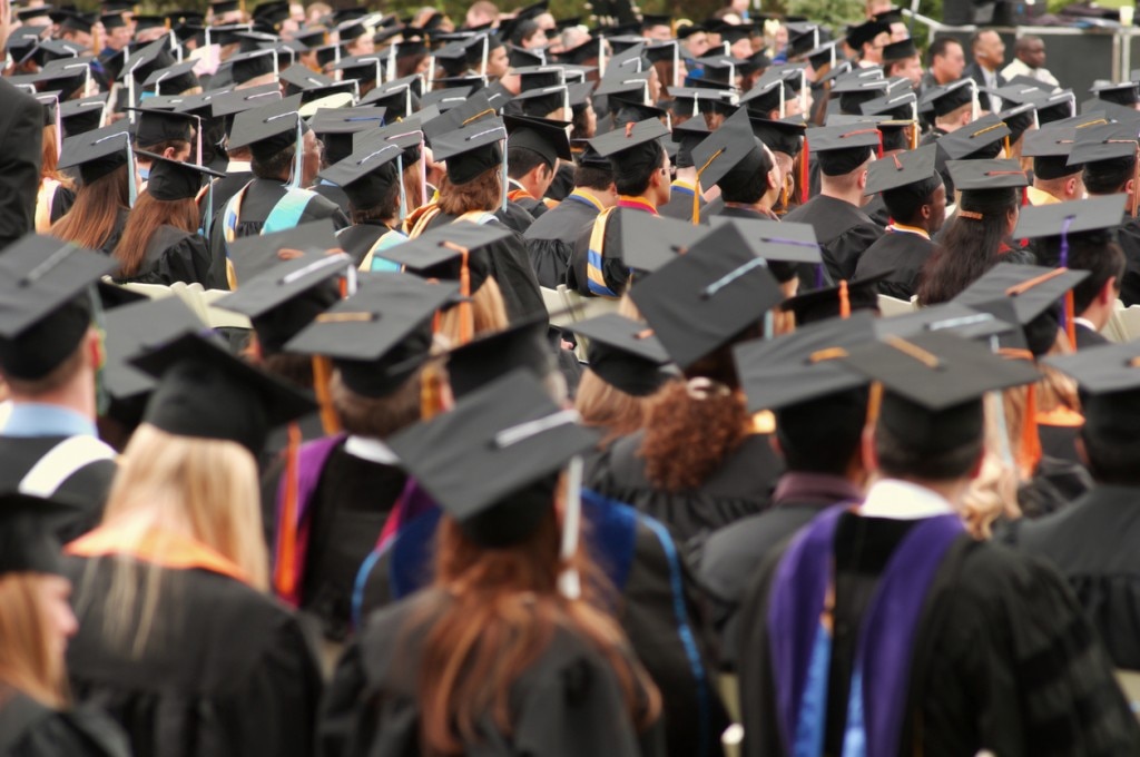 Student in graduation caps and gowns