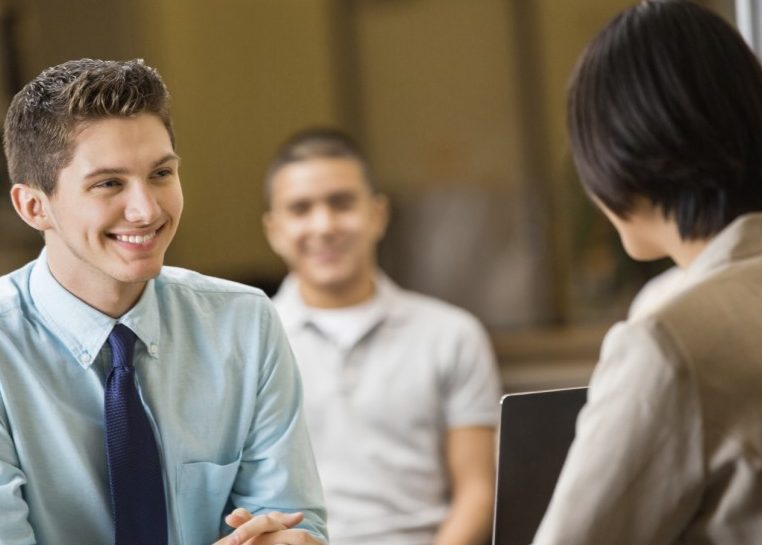 Student speaking with recruiter