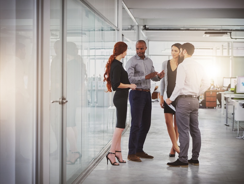 People in an office networking