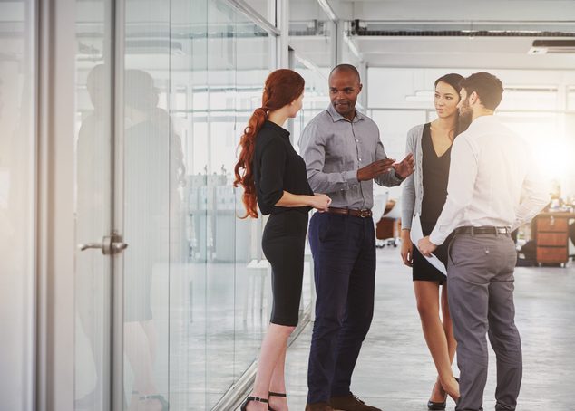 People in an office networking