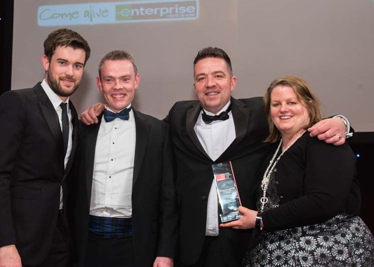 Enterprise employees accepting an award