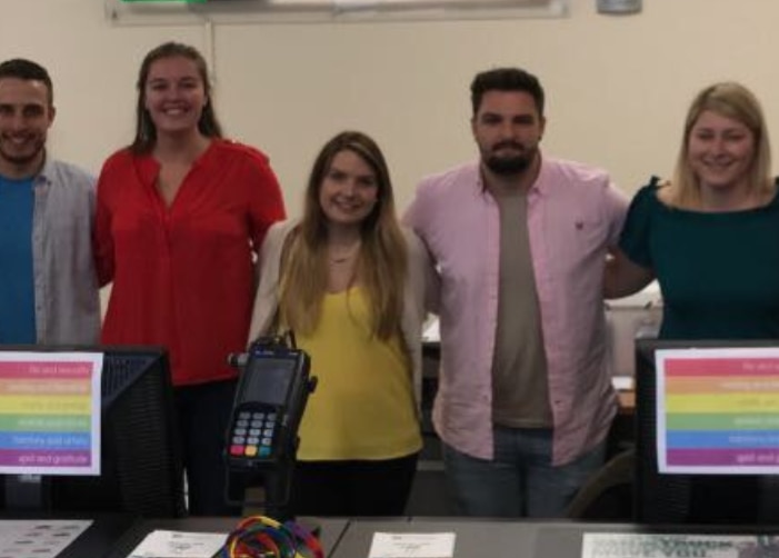 Group of Enterprise employees at the checkout counter