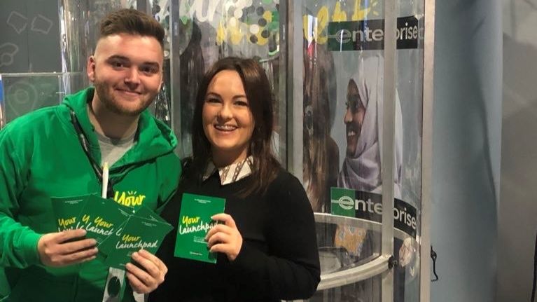 Dylan with a female employee at an Enterprise event