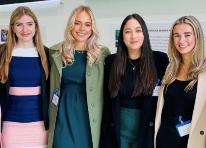 2022 Interns group picture in business attire