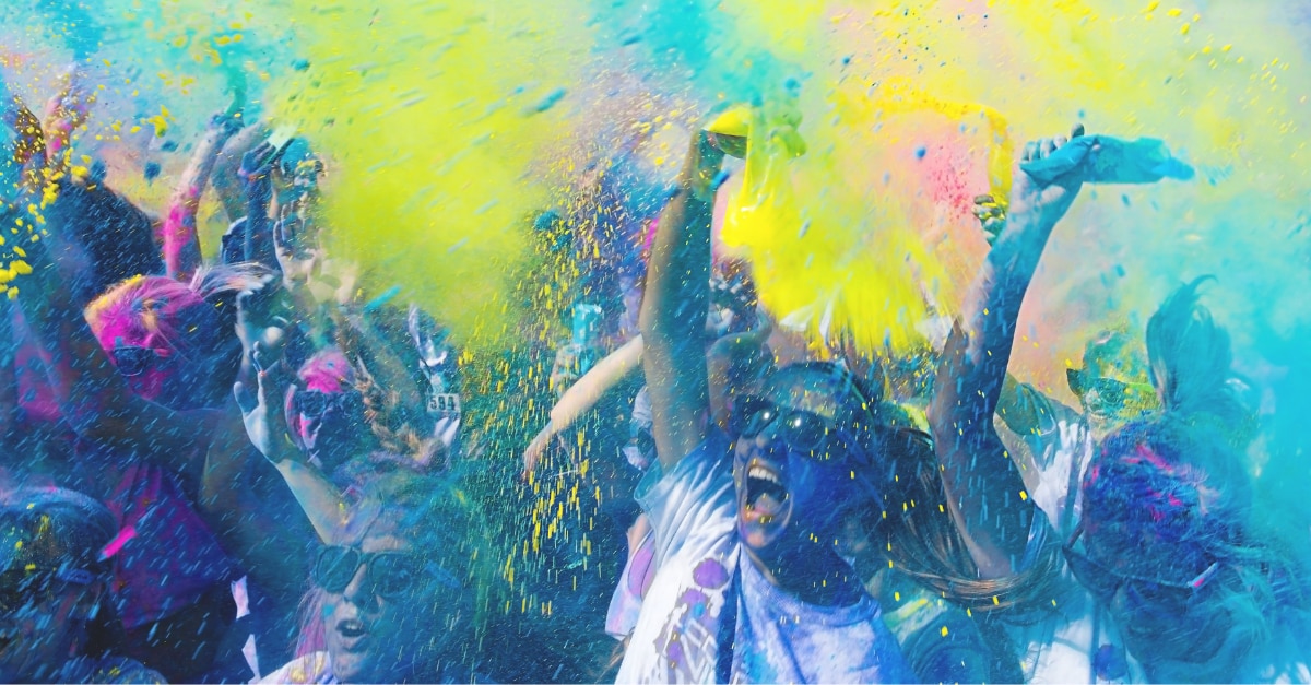 Students getting covered in neon paint