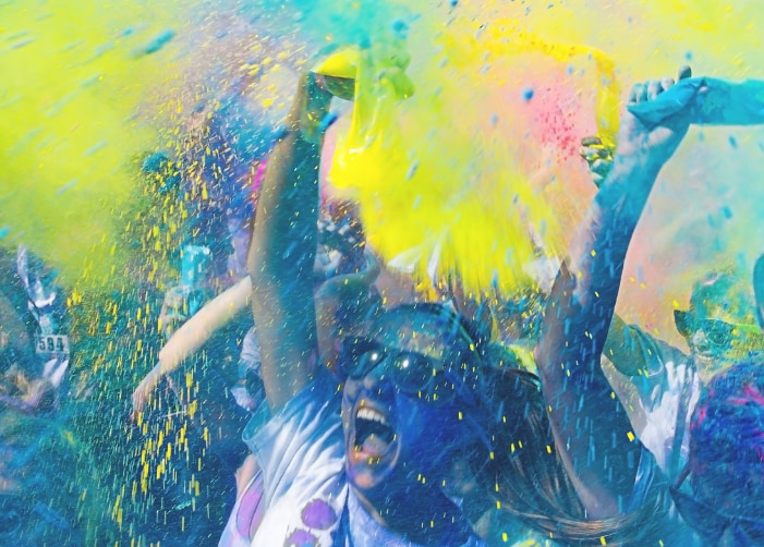 Students getting covered in neon paint