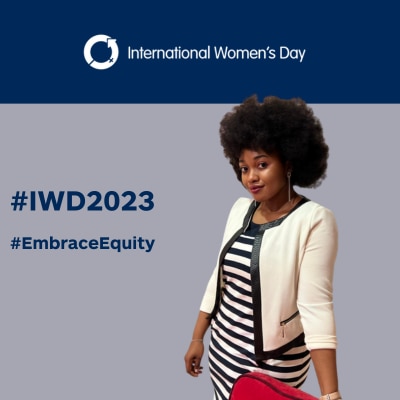 Mary in black and white dress on #IWD2023 background