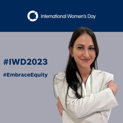Jenni embrassing herself on #IWD2023 background