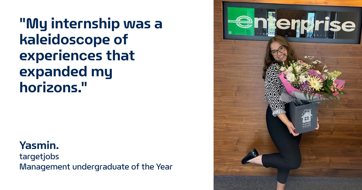 Yasmin picture with flowers in front of Enterprise sign with quote