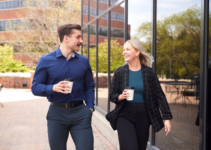 Two-EM-Employees-Drinking-Coffee